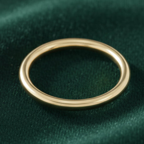 Gold ring on a white background