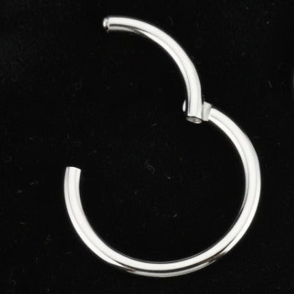 Set of metallic hoop earrings with size labels on a white background